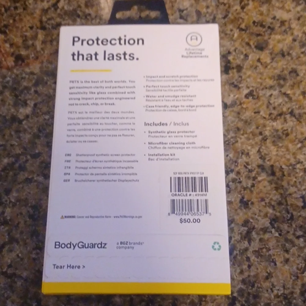 IPhone synthetic glass screen protector. Unopened box, never used, $50 value.